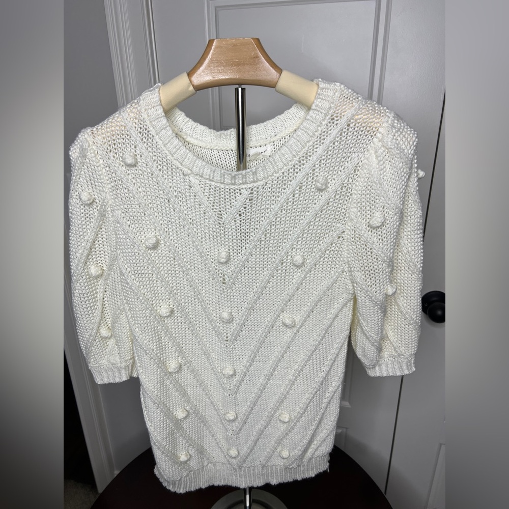 Elegant Cream Women's Sweater with Pom-Pom Design